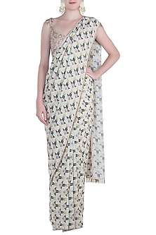 OFF WHITE PRINTED SAREE WITH BLUSH TASSELS BLOUSE by PAYAL SINGHAL