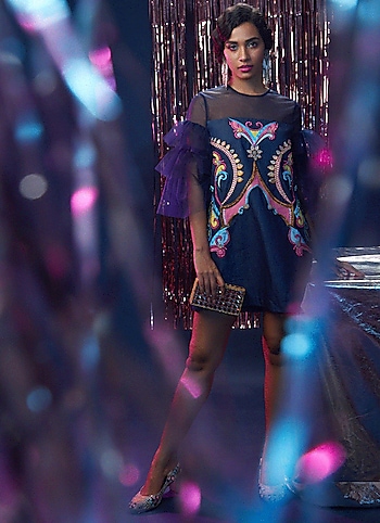 Be dance floor ready in this uber-chic dress by Manish Arora. Finish off your look with statement earrings and a clutch to accessorize. by Night Out Glam